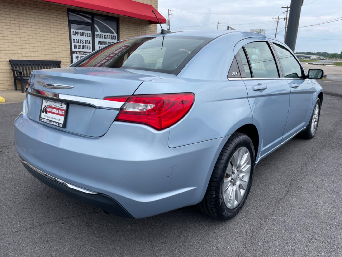 2014 Blue Chrysler 200 (1C3CCBAB0EN) with an 4-Cyl, 2.4 Liter engine, Automatic, 4-Spd transmission, located at 8008 Warden Rd, Sherwood, AR, 72120, (501) 801-6100, 34.830078, -92.186684 - Photo#7